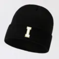 Black knitted beanie hat with letter I patch, stylish warm winter cap for men and women. - Adjustable / Letter I