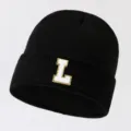 Black knit beanie with stylish white and gold letter L patch, warm winter hat for men and women. - Adjustable / Letter L