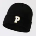 Black knit beanie hat for men and women, featuring a white and gold letter P patch design. - Adjustable / Letter P
