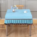 Detail view of the elegant blue square mahjong table cover with stylish brown ruffled trim. - Deep Sky Blue