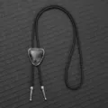 Detail view of a vintage PU braided bolo tie with a marble-patterned slider. - Black