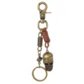 Porte-clés tête de mort en bronze vintage avec lanière en cuir et pendentif dé original - Cuir Marron
