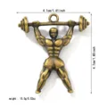 Vintage bronze fitness man lifting barbell pendant with dimensions and weight info - Gym Man