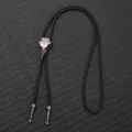 Vintage bird skull bolo tie with engraved Nordic runes on black braided leather cord - Antique Silver