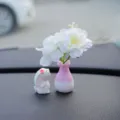 Mini car vase ornament with cute rabbit figurine, pink and white artificial flower decor. - Bunny with Peach Blossoms and Tricolor Bottle