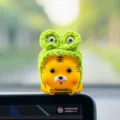 Cute tiger car dashboard ornament with green frog hat, fun auto interior decoration item. - Frog / Tiger