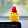 Cute cartoon tiger car ornament with Christmas hat, perfect dashboard decor for vehicle interior. - Little Red Riding Hood / Tiger