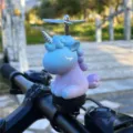 Χαριτωμένο στολίδι τιμονιού ποδηλάτου μονόκερος με περιστρεφόμενη έλικα για σκούτερ. - Μονοκέρος με Στήριγμα / Μωβ
