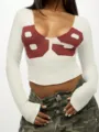 Detail shot of a sexy slim crop long sleeve T-shirt with bold number print and U-neck. - Off White