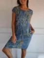 Damen Baumwolle Leinen Kurzarm Blumenprint Rundhals Kleid mit Taschen Detailansicht. - S / Blau