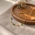 Eleganter Gold-Titanstahl-Halskette mit grünen Zirkonia-Blütenanhängern für Frauen - Grün Zirkonia Tulpe Armband / Gold