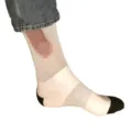 Detail view of funny novelty prank socks with black heel and toe, comfortable daily wear. - Jacquard / Color Block