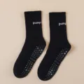 Professional black anti-slip yoga socks for women, comfortable pilates mid-tube cotton floor socks. - One Size / Black