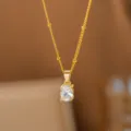 Elegante goldfarbene Halskette mit funkelndem ovalem Kristallanhänger für Damen - Oval (8402)