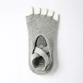 Grey five toe yoga socks with cross straps and non-slip grip soles for pilates fitness. - One Size / Light Gray Half Finger