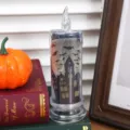 Halloween LED simulation candle detail shot, transparent castle shell, spooky party decor. - Green Castle (With Candlestick) / 6.5x18cm