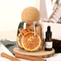 Juego de botella de vidrio de naranja seca con canela de aromaterapia decoración - Botella de la fortuna Tipo A - Pequeña con base de madera (aceite esencial gratis)