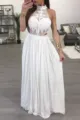 Detailed view of the elegant white lace halter top and flowing long skirt outfit. - White
