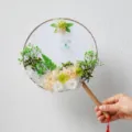 Handmade preserved flower round fan DIY kit with dried roses, green leaves and wooden handle. - Tianqing Fan Material Pack