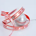 Red ribbon with silver hot-stamped text for gift wrapping, bouquet packaging, and party decor. - Red Silver Stamping JUST Style