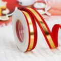 Red and gold metallic ribbon roll for gift wrapping, bouquet packaging and holiday party decor. - Bronzing Striped
