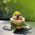 Walnut car aroma diffuser ornament with natural acorns and green ribbon decoration style. - Fruitful Harvest Mix