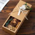 Kraft paper gift box with dried flowers, pinecones, and ribbon, rustic vintage style. - Hydrangea & Dried Flower Gift Box Set (Size 12x12x5cm)