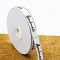 Cinta impresa de poliéster de 1cm para embalaje de regalos y manualidades en rosa claro. - 1,0 cm x 25 yardas / Blanco Blanqueado