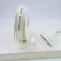 Bleached white organza ribbon 2.5cm wide with Happy Birthday text for gifts. - White