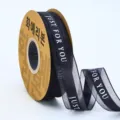 Cinta transparente negra de 2.5cm con estampado, ideal para envolver regalos, pasteles y flores. - Negro