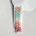 Detailed view of colorful grosgrain ribbon swallowtail hair bow clips set for women and girls. - 6cm Grosgrain Fishtail 10 Pcs/Card [02]