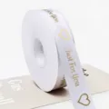 Rotolo nastro bianco 2.5cm con stampa dorata Just For You e cuori per confezioni regalo. - Bianco