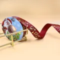 Nastro natalizio stampato con testo dorato Merry Christmas per decorazioni fai da te - Bordeaux Cartone Animato 2.5cm 25 Yards