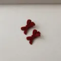 Detail view of red velvet bow hair clips, soft flocked texture design, side clip accessory. - Small Bow Duckbill Clip / Burgundy