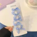 Blue plaid bow hair clips set, cute sweet fabric hairpins for women and girls daily styling. - Blue
