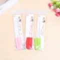 Detailed view of colorful silicone spatula baking set in clear hanging packaging bags. - Small Spatula in Card Bag