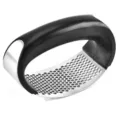 Stainless steel curved garlic press with ergonomic black handle for kitchen cooking tools. - With Steel Edge / Black