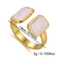 Detail of 18k gold-plated geometric ring featuring white enamel rectangular design - 1.8cm / Double White Shell Geometric