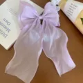 Light purple shimmering organza bow hair clip with long ribbons, elegant accessory. - 16x26cm / Purple