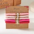 Juego de pulseras de cuentas Heishi para San Valentín con dijes de corazón rosa y tarjeta - Set de 5 Pulseras - Corazón Degradado