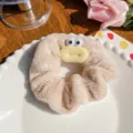 Coletero de monstruo de peluche beige con ojos grandes y una textura suave y esponjosa. - Estilo Boca de Salchicha / Boca de Salchicha Café Claro