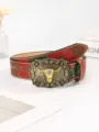 Vista dettagliata di una cintura cowboy Western con motivo floreale e fibbia con toro. - 100 / Ambra