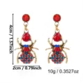 Boucles d'oreilles araignée punk avec cristaux rouges bleus, dimensions 4x2cm, poids 10g. - Style Araignée Dorée (ER26Y0298-1)