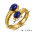 Detailed macro view of a gold sunburst open ring with blue stones and size annotations - 1.8cm / Lapis Lazuli Sunburst