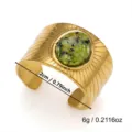Detail of gold stainless steel ring with green stone showing 2cm width and 6g weight - 1.8cm / Wide Green Stone Textured