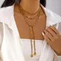 Elegant gold multi-layered Y-shaped wrap necklace featuring cube beads and tassel drops - Gold Square Bead Tassel Style (NC25Y1070-3)