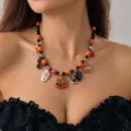 Handcrafted Halloween beaded necklace featuring pumpkin, skull, and black cat charms - Pumpkin Cat Beaded Style (NC26Y0378) / Orange and Black