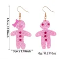Orecchini a omino di pan di zenzero rosa glitterati con info su dimensioni e peso - Omino Pan di Zenzero Morsicato
