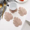 Monstera leaf PVC gold-stamped coasters, heat-resistant table mats for cups and wine glasses. - 12x10cm / Rose Gold