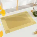 Premium PVC woven placemat, heat-resistant and waterproof table mat for modern dining room decor. - Gold